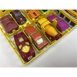 Matchbox 1-75 Series vinyl carry case containing 47 playworn and repainted die-cast models by various makers