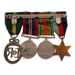 WWII British medal group comprising War medal, Defence medal and 1939-1945 star, together with EII Efficiency Decoration with Territorial bar, with 1955 engraved to reverse 