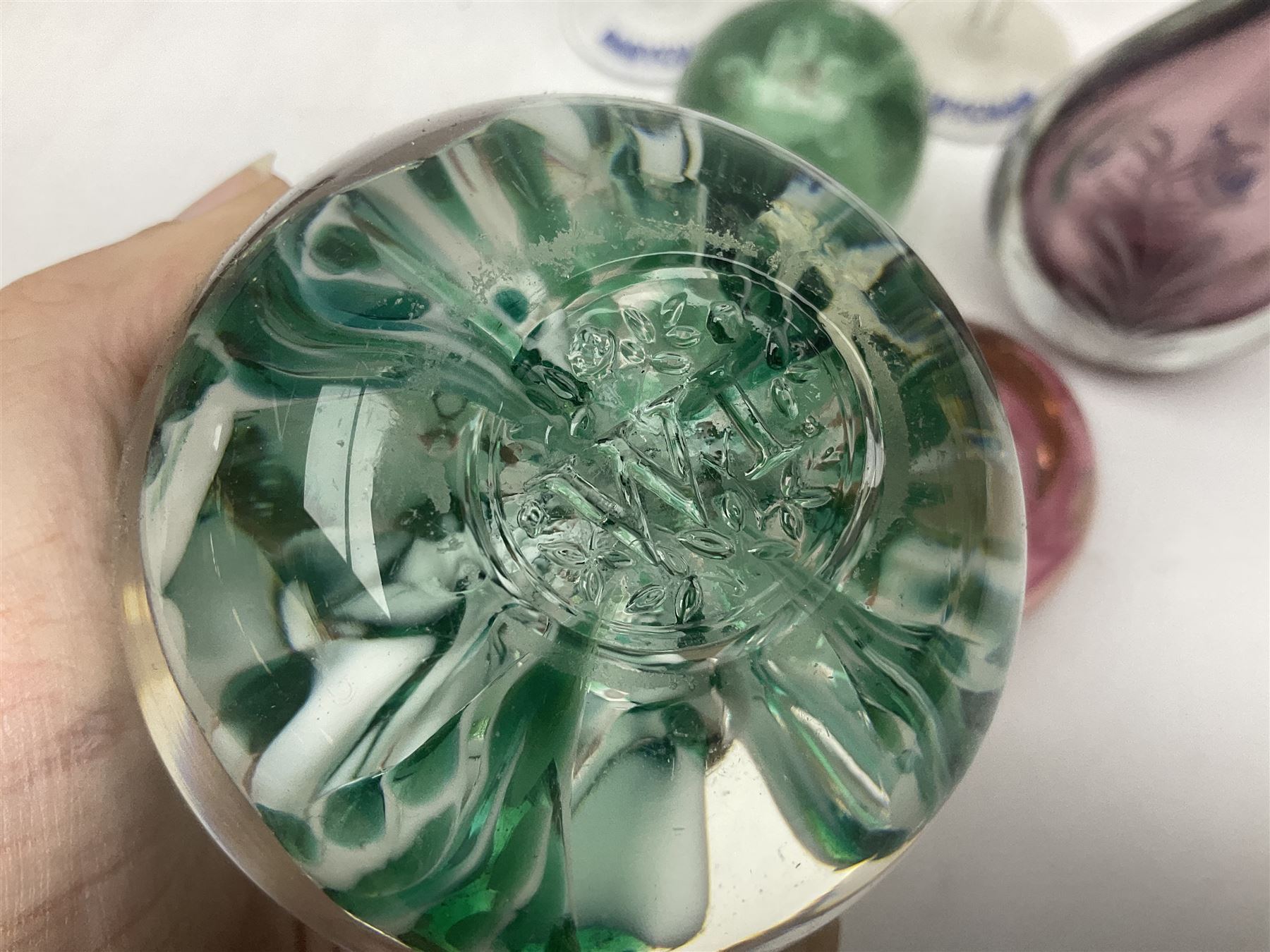 Five Babycham glasses, together with five paperweights, to include examples from Liskeard glass etc