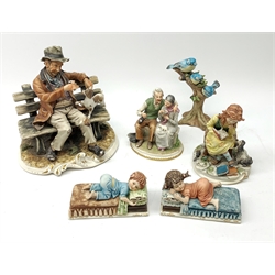 A selection of Capodimonte figures, comprising a large figure group modelled as a tramp on a bench with dog, a smaller group of a girl and dog, marked Gianni, another group of an elderly couple, two figures of sleeping children marked Maria Augela, and an Italian figure of three blue tits perched upon a tree branch. 