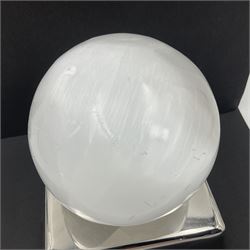 Selenite sphere, upon a square metal base, D13cm