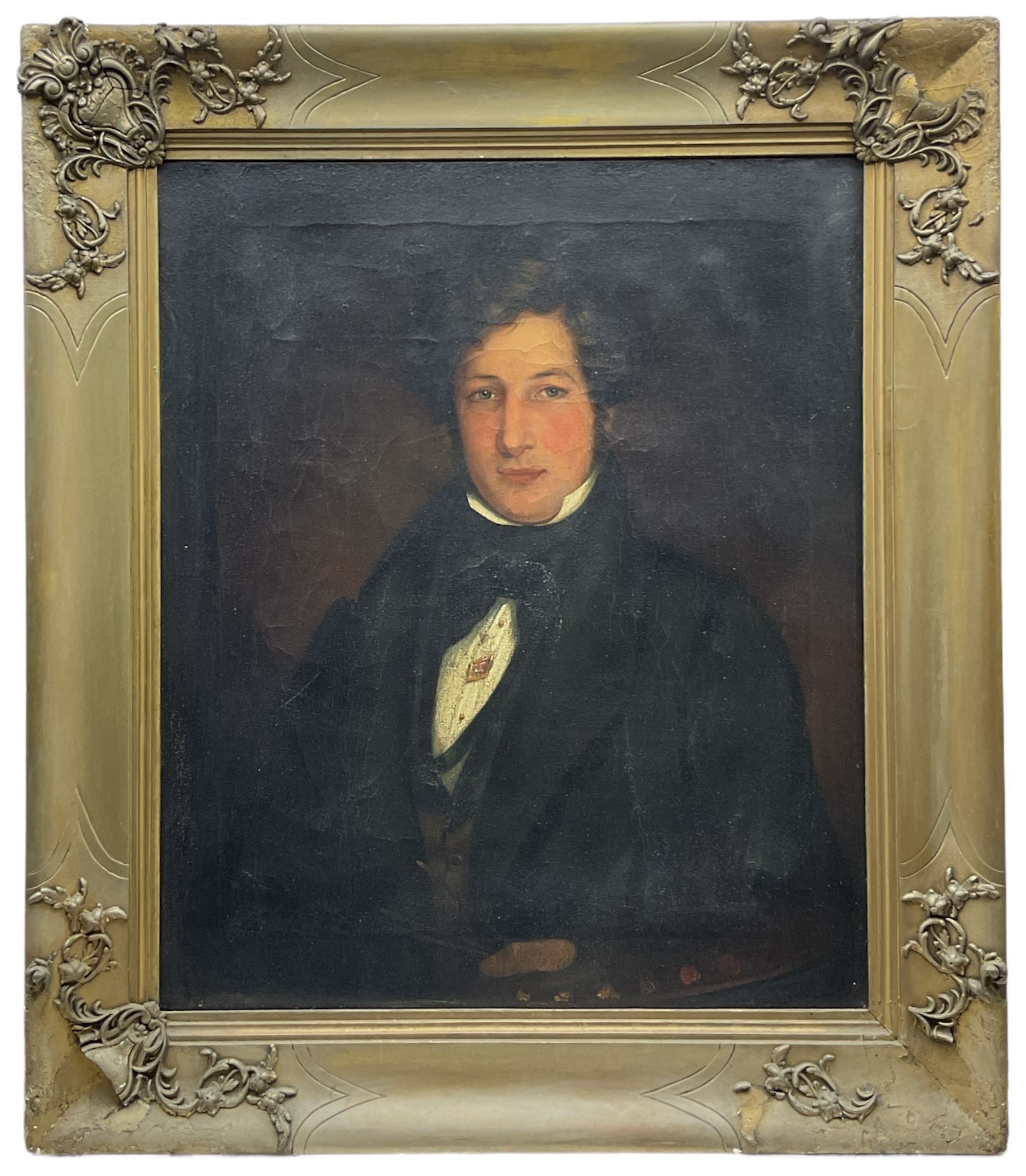 English School (Early 19th century): Half Length Portrait of a Regency Period Gentleman, oil on canvas unsigned, housed in moulded gilt frame with cartouche corners 75cm x 62cm 