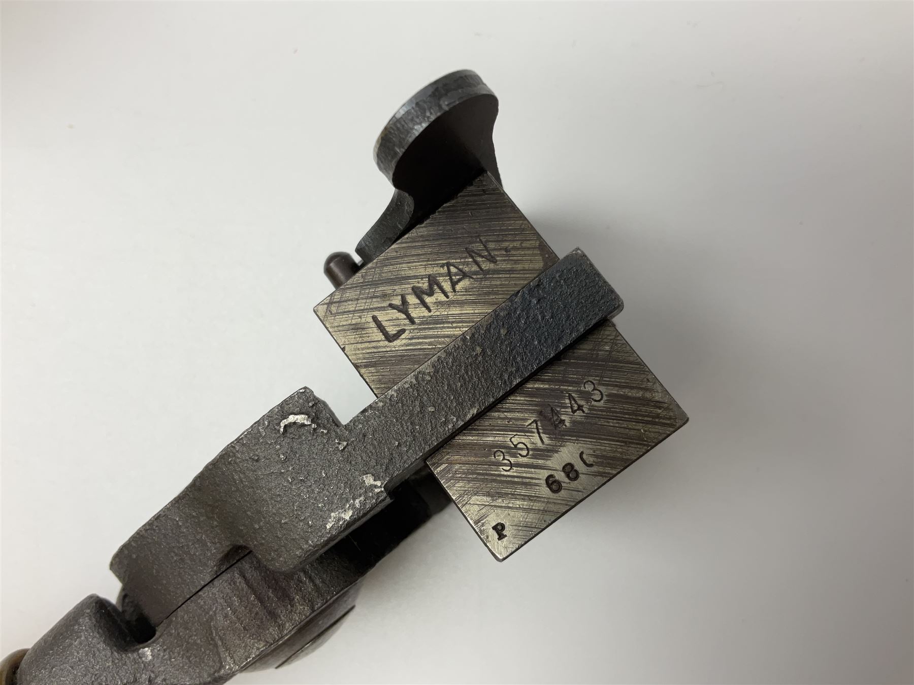 Three modern bullet moulds comprising Lee double cavity .44 calibre, boxed with instructions; and two Lyman .38 calibre; all in unrelated 19th century mahogany box