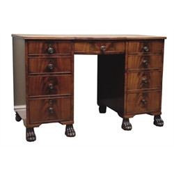  Regency period mahogany kneehole desk, reeded bow break front top above nine graduating figured drawers with scumbled paper linings, on carved paw feet, W115cm, H74cm, D59cm  