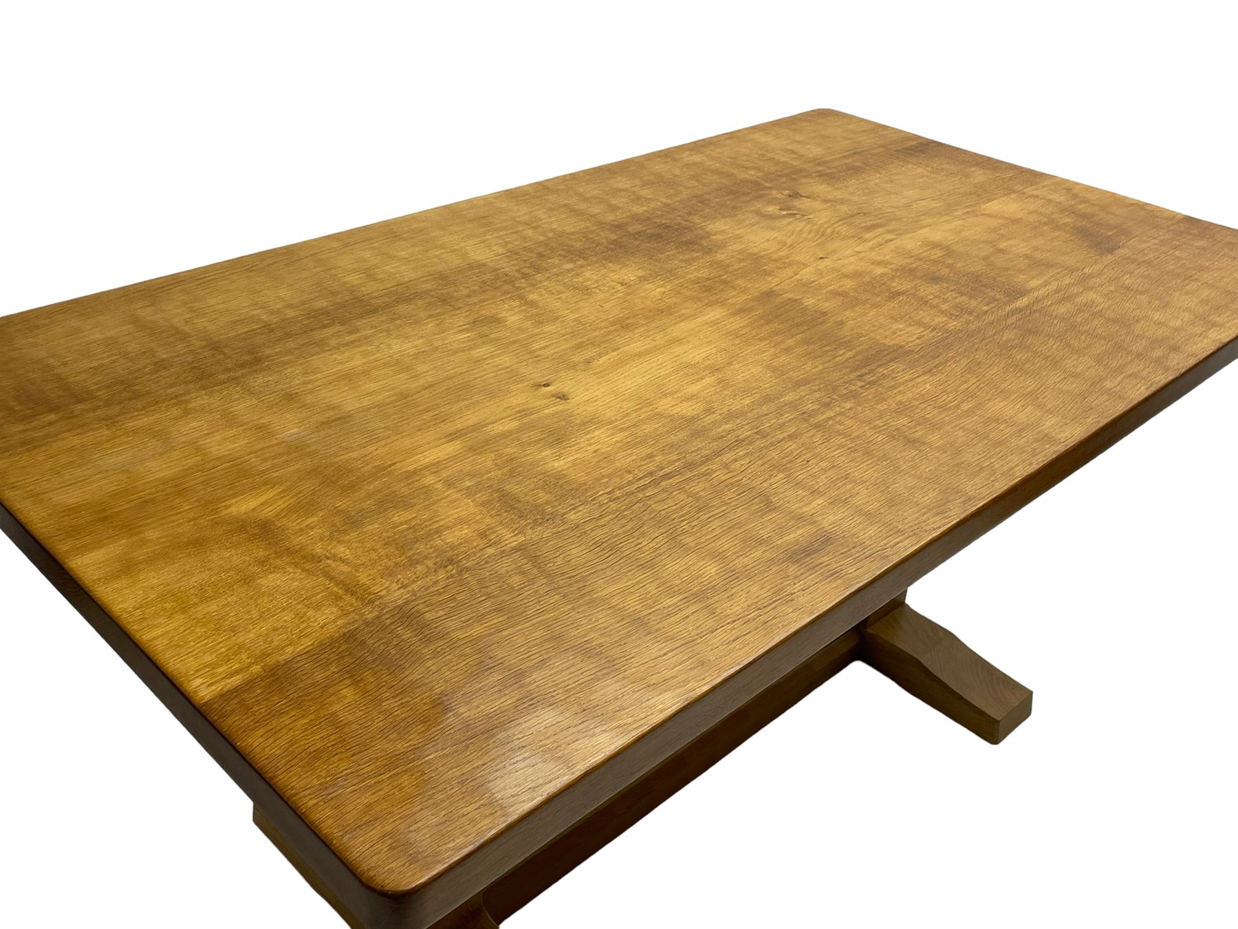 Mouseman - oak dining table, adzed rectangular top on twin octagonal pillar supports, sledge feet united by floor stretcher, by the workshop of Robert Thompson, Kilburn 