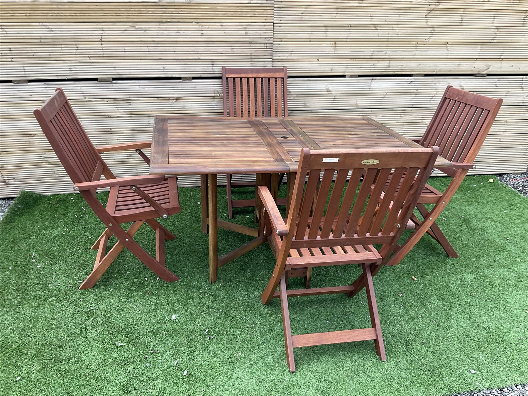 Winchester Collection - 20th century teak garden table drop-leaf table and set four matching folding chairs - THIS LOT IS TO BE COLLECTED BY APPOINTMENT FROM DUGGLEBY STORAGE, GREAT HILL, EASTFIELD, SCARBOROUGH, YO11 3TX