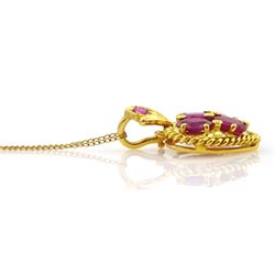 18ct gold ruby set heart shaped pendant, on 9ct gold chain necklace