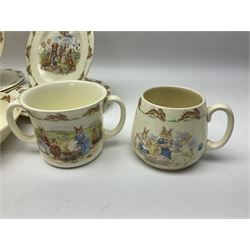 Royal Doulton Bunnykins nursery wares, including twin handled mugs, bowls, plates (17) 