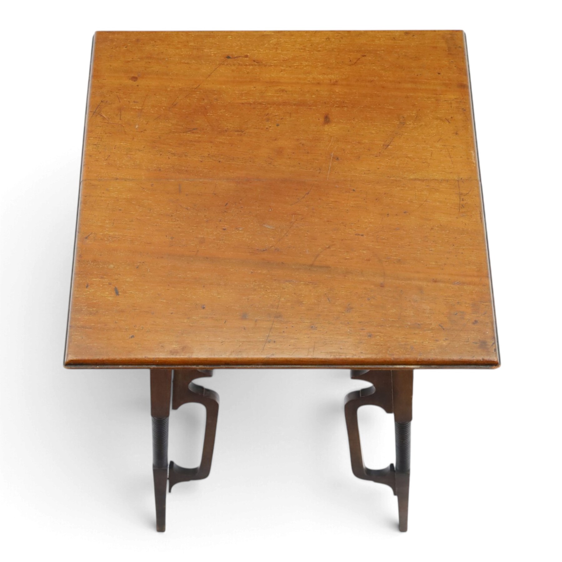 Art Nouveau design mahogany side table, square moulded top over pierced scroll shaped aprons, on four openwork supports