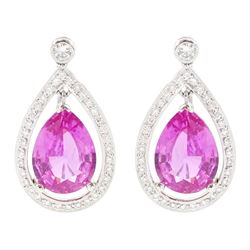 Pair of 18ct white gold pink sapphire and diamond earrings, the pear cut sapphires suspend...