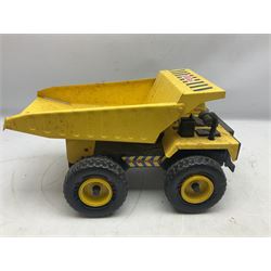 Tonka - five large scale pressed steel vehicles comprising Cement Mixer, Mobile Crane, Bulldozer and two Dumper Trucks (5)
