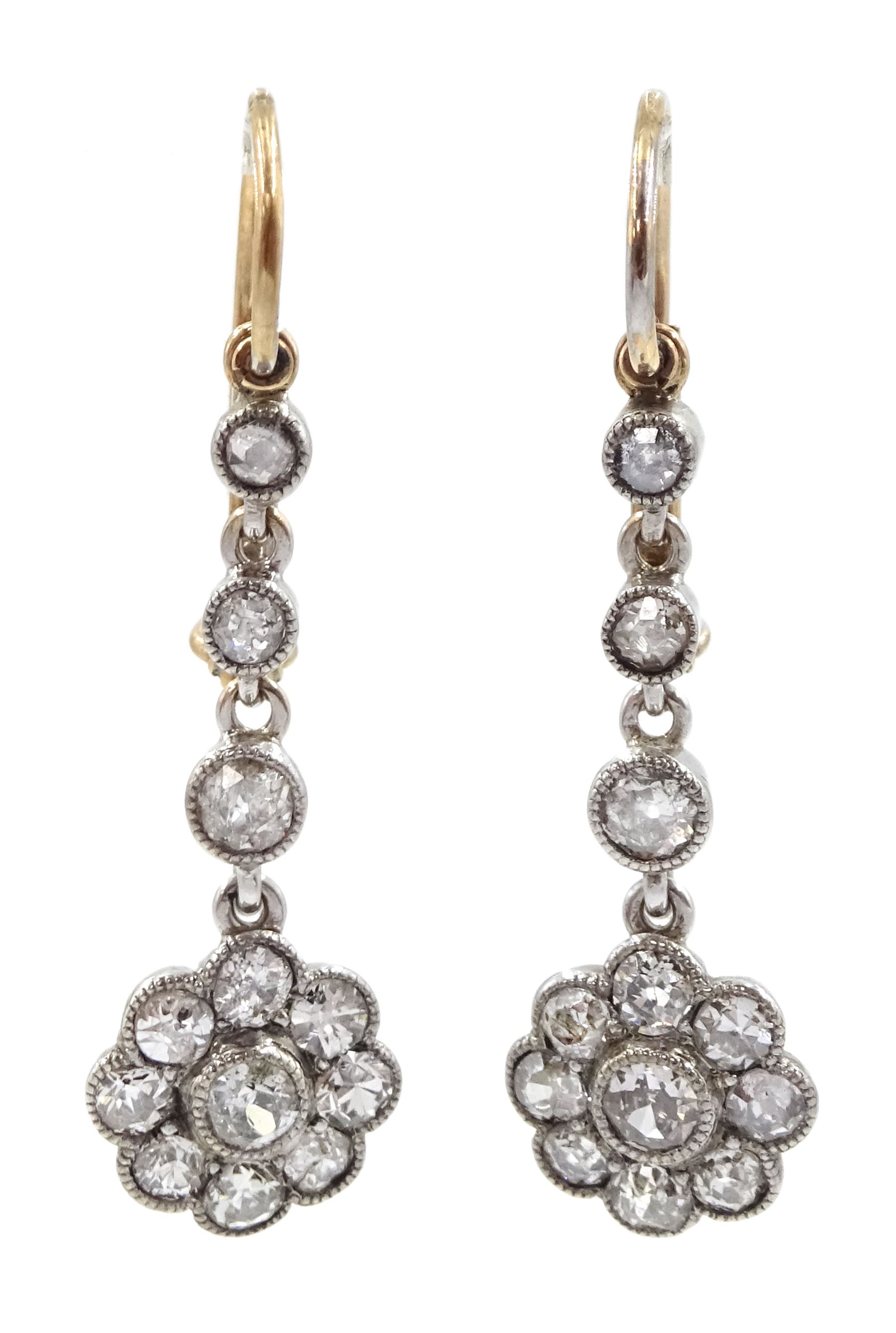 Pair of early 20th century gold and silver milgrain set old cut diamond cluster pendant earrings, total diamond weight approx 1.00 carat