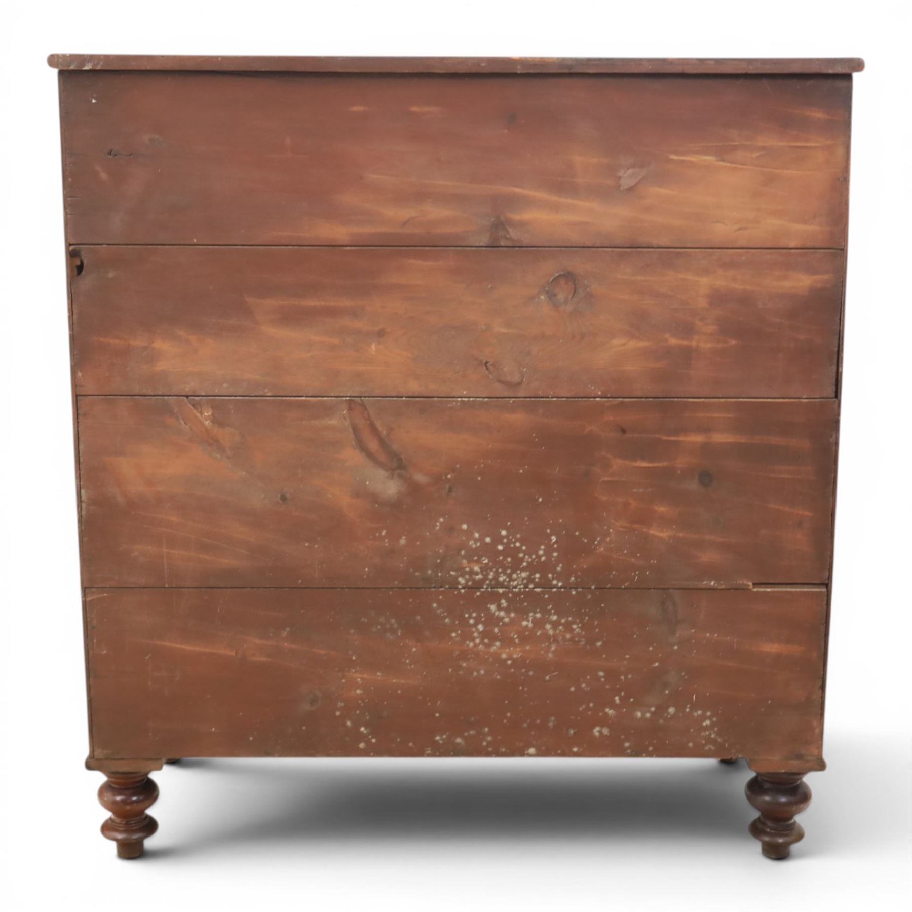 Victorian mahogany chest, with four long  flame mahogany fronted drawers with turned wooden knobs, raised on turned bun feet 