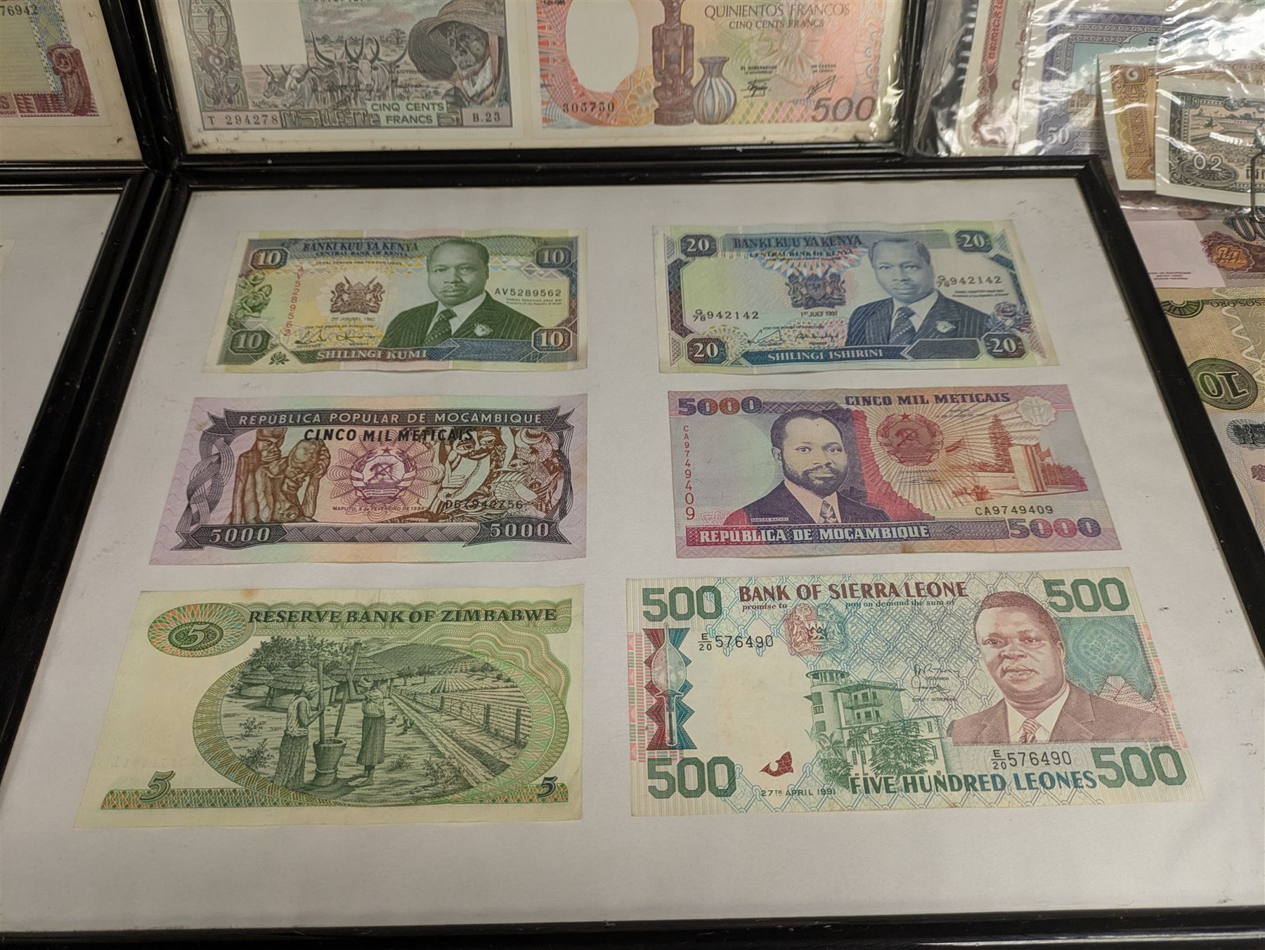 World banknotes, including Central Bank of Nigeria, Indonesia, Central Bank of Egypt, Republic of Liberia, Central Bank of Kenya, Central Bank of the Gambia, Singapore, Belgium etc, loose and in five framed displays