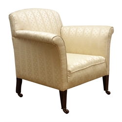  Edwardian armchair upholstered in ivory damask, arched back and outscrolled arms with loose seat cushion, on square tapered supports with brass sockets and castors,  H84cm, D69cm  