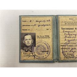 WW2 Soviet KGB officer I.D. book containing photograph, seal stamps and signatures. Roughly translates as 'USSR Peoples Commissariat for Internal Affairs Krasnoyarsk Region Directorate Senior Lieutenant 1st Class Deputy Head of Communications Nikolay Storozhuk c1943