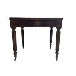 George III and later mahogany extending dining table, fold-over rectangular top with moulded edge, pull-out action base, on reeded carved turned supports with brass cups and castors