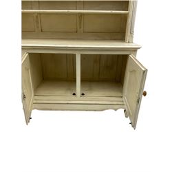 Large French style cream painted dresser, fitted with four cupboards and three tier plate rack