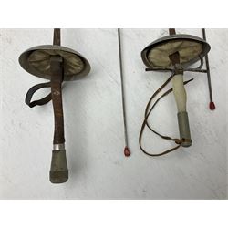 20th century Indian Tulwar sword with 71cm plain curving steel blade and iron hilt with extended langets, knopped grip and spiked pommel; in canvas covered wooden scabbard L87.5cm overall; together with five fencing swords comprising four foils and one epee, three marked Leon Paul, one in carrying case (6)