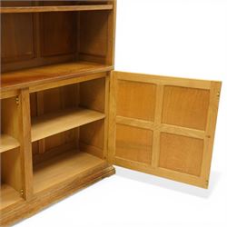 Beaverman - Yorkshire oak open bookcase, with adjustable shelves, panelled sides and lower cupboard doors, with carved beaver signature, by Colin Almack of Sutton near Thirsk
