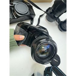 Six Minolta Dynax SLR camera bodies, comprising 800si serial no. 62703606, three 7xi examples, including one boxed example, serial nos. 20106944, 16123311 & 22107553, and two 9xi examples, serial no. 18209901 & 18202113, with three Minolta lenses, including Zoom xi 28-105mm 1:3.5(22)-4.5 lens, AF Zoom 28-85mm 1:3.5 (22)-4.5 lens and an AF Zoom 75-300mm 1:4.5(32)-5.6 lens, Hama carry case and other accessories