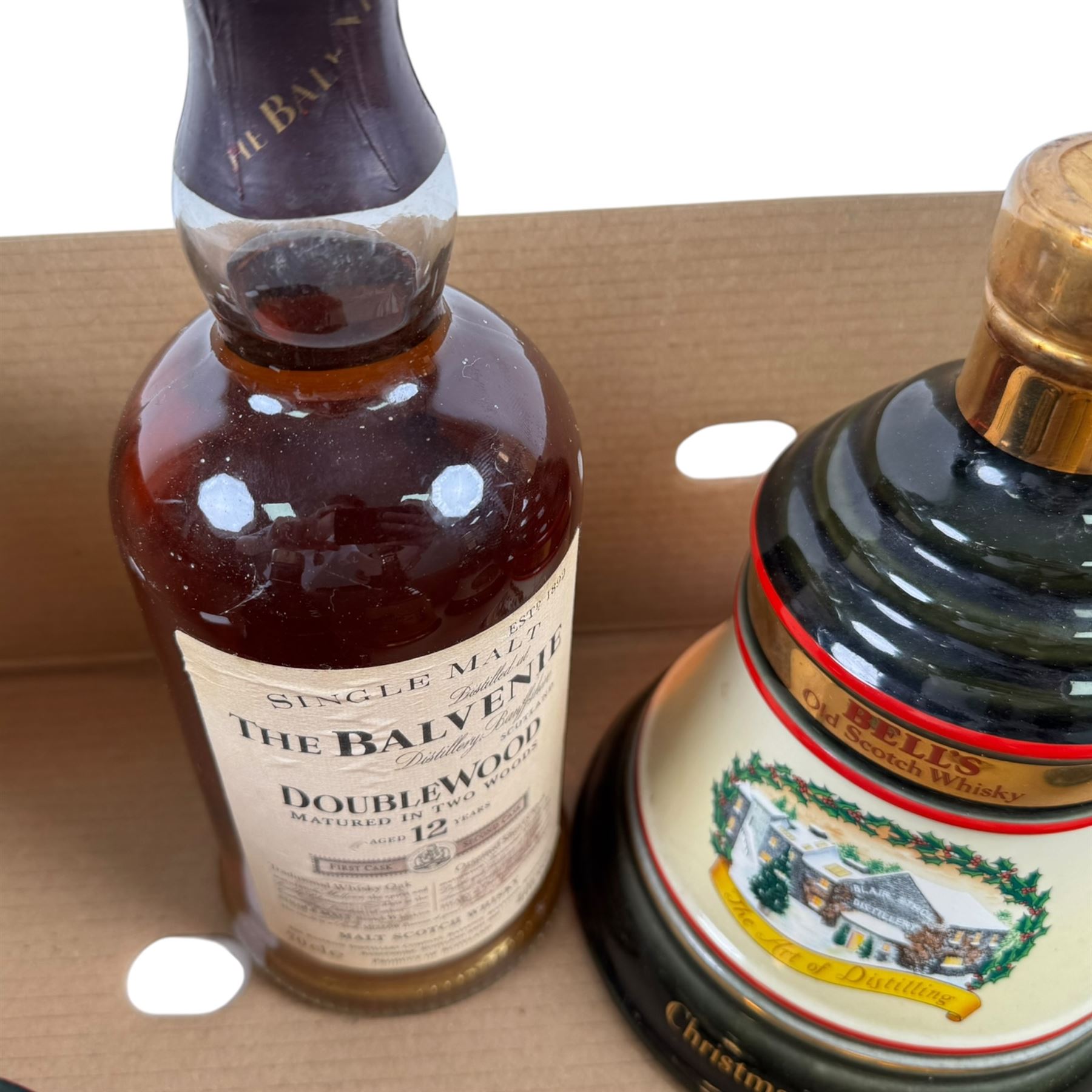 The Balvenie 12 year old DoubleWood single malt Scotch whisky, together with five Bell's Blended Scotch Whisky in Wade decanters, various contents and proof 
