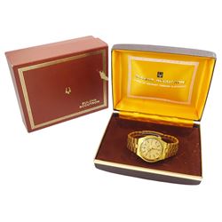 Bulova Accutron gentleman's gold-plated and stainless steel quartz wristwatch, Ref. 7083-5, Cal 21826, champagne dial with baton hour markers and day / date aperture, on original gold-plated bracelet, with fold-over clasp, boxed