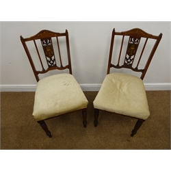  Edwardian inlaid seven piece salon suite comprising of mahogany framed double ended chaise lounge (L177cm), a pair of his and hers chairs and set four salon chairs, upholstered in a beige fabric (7)  