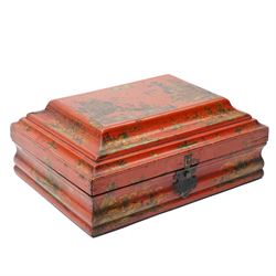 Early 19th century red lacquered chinoiserie box, painted with a traditional landscape scene and heightened in gilt, with original metal fastenings and hinges, W29cm 