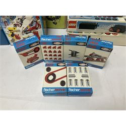 Fischer Technik/Lego/Playmobil - thirteen model building sets comprising eight Fischer Technik sets 50, 50/1, 50v, 50/2, 50+mot1 and two 50S, 50/1 add-on pack, with spare parts packs 01, 03, 05, two 22 and 30; two Lego sets comprising C107 and Lego Systems 103, part-set 870 and 970; Playmobil no.3520 set; four boxes of loose lego, various instruction manuals and a scrapbook 