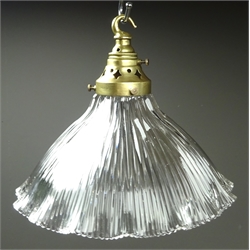  Set of six early 20th century Holophane hanging light fittings with reeded clear glass shades and pierced brass fittings, Pat. No.28498/15. Provenance Harome Methodist Chapel, D25cm (6)  