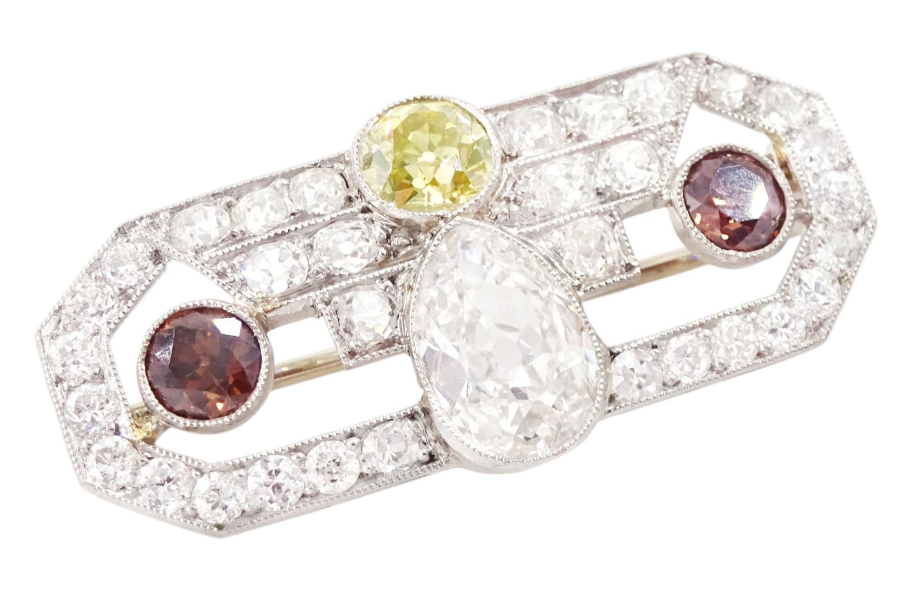 Early 20th century platinum diamond brooch, milgrain set with a pear cut faint brown diamond of approx 1.50 carat, an old cut fancy yellow / green diamond of approx 0.70 carat, and two old cut fancy orange / brown diamonds of approx 0.40 carat and 0.35 carat, surrounded by old cut white diamonds in an openwork setting, total white diamond weight approx 1.45 carat