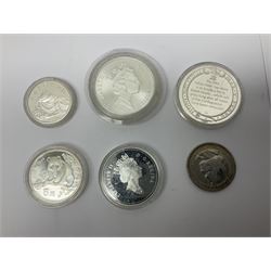 United States of America 1896 Morgan one dollar coin, 1893 'Columbian Exposition' commemorative half dollar, 1945 standing Liberty half dollar, Queen Elizabeth II Australia 1993 one ounce fine silver dollar, Canada 1967 and 1995 one dollar coins etc (15)