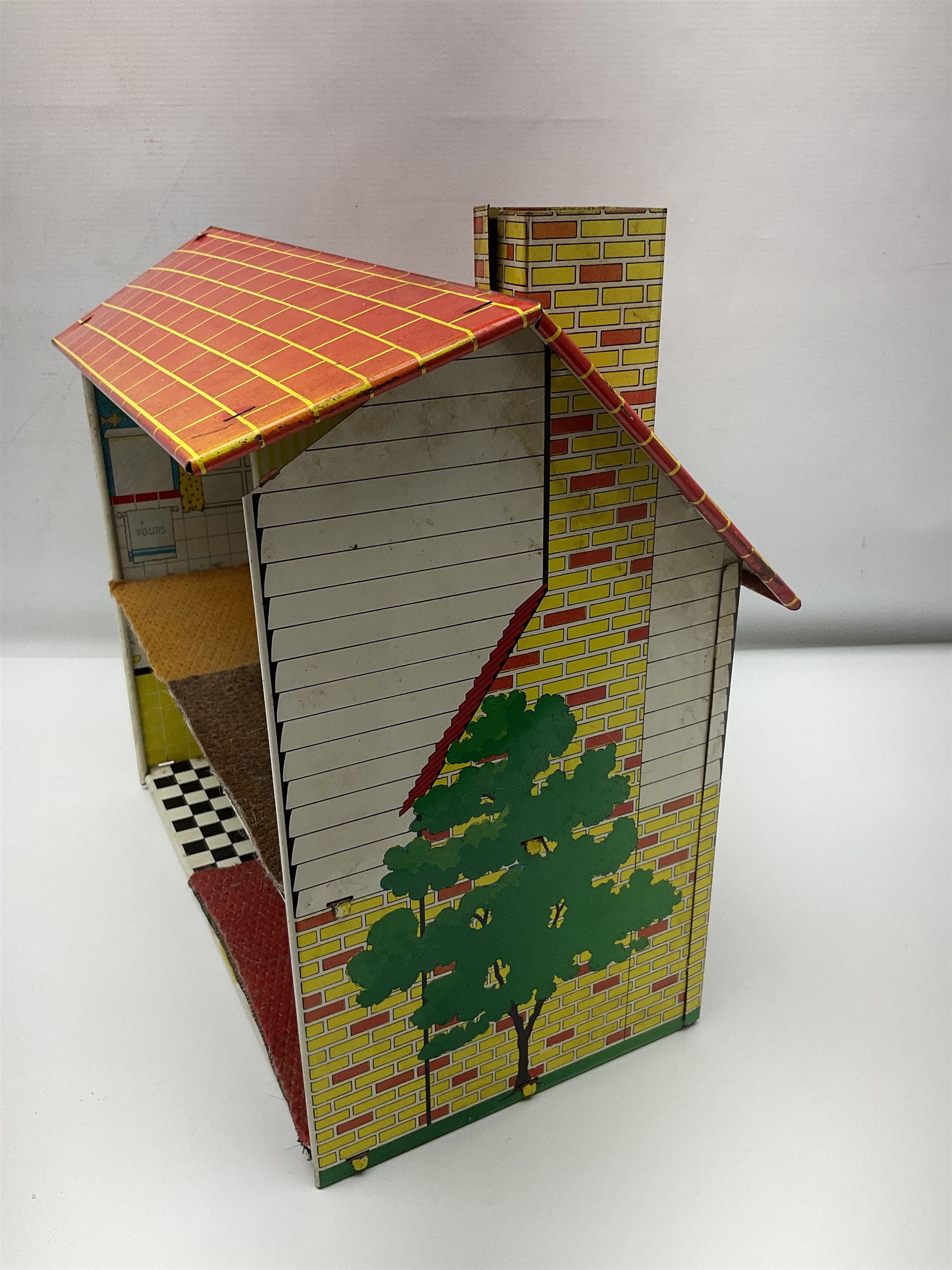Mid-century Marx style tin dollhouse and quantity of dolls house furniture, H35cm