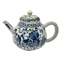 18th century Chinese blue and white teapot, painted with floral sprays, with lobed body and cover, H11cm