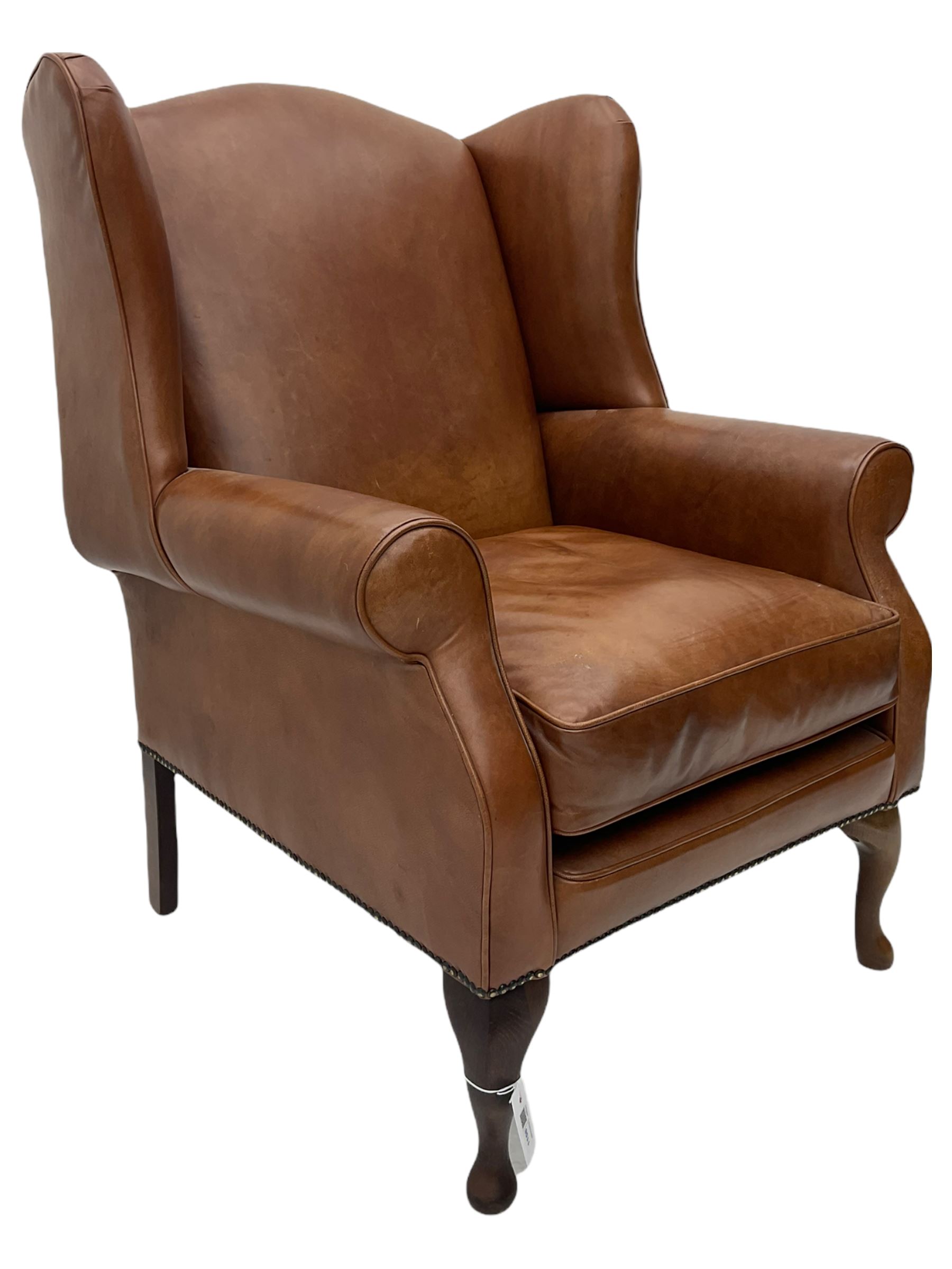 Laura Ashley - wingback armchair, upholstered in brown leather, on cabriole front feet