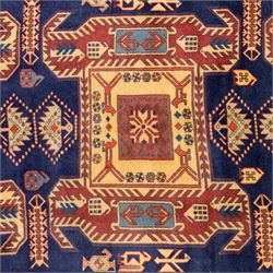 North West Persian Ardebil hand-knotted runner, indigo blue field composed of a repeating series of large stepped octagonal medallions enclosing a central hooked motif and stylized rosette, flanked by angular ivory and madder red latch hook devices, medallions linked by smaller geometric diamonds and serrated lozenges, guard borders with reciprocal motifs and main ivory border decorated with angular vines, with cotton fringe ends 