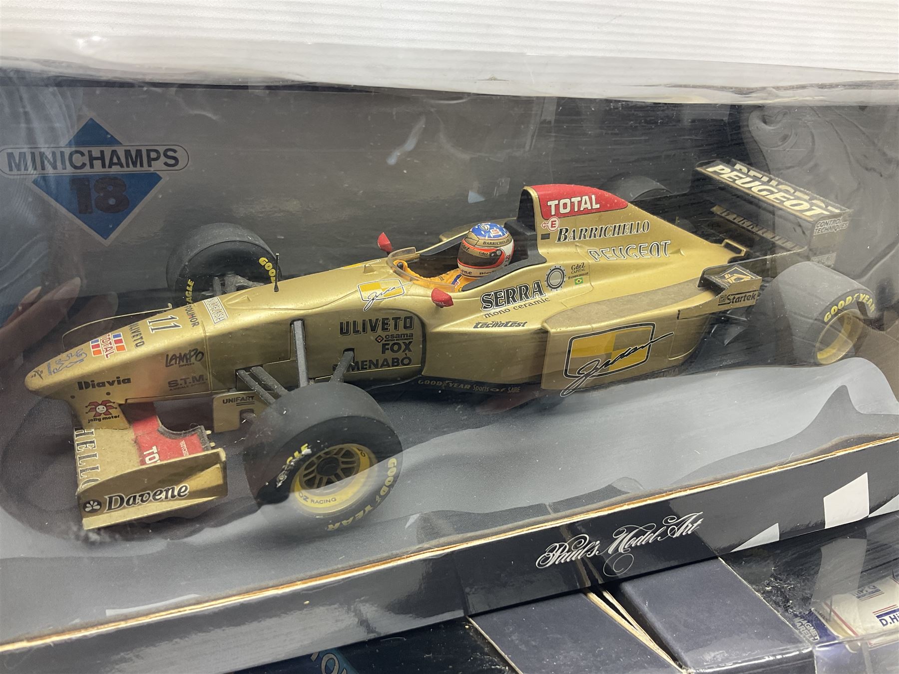 Three Minichamps '18' 1:18 scale die-cast racing cars - Jordan Peugeot 196 1996 R. Barrichello; Benetton Renault B196 G. Berger; and Williams Renault FW18 D. Hill; all boxed (3)