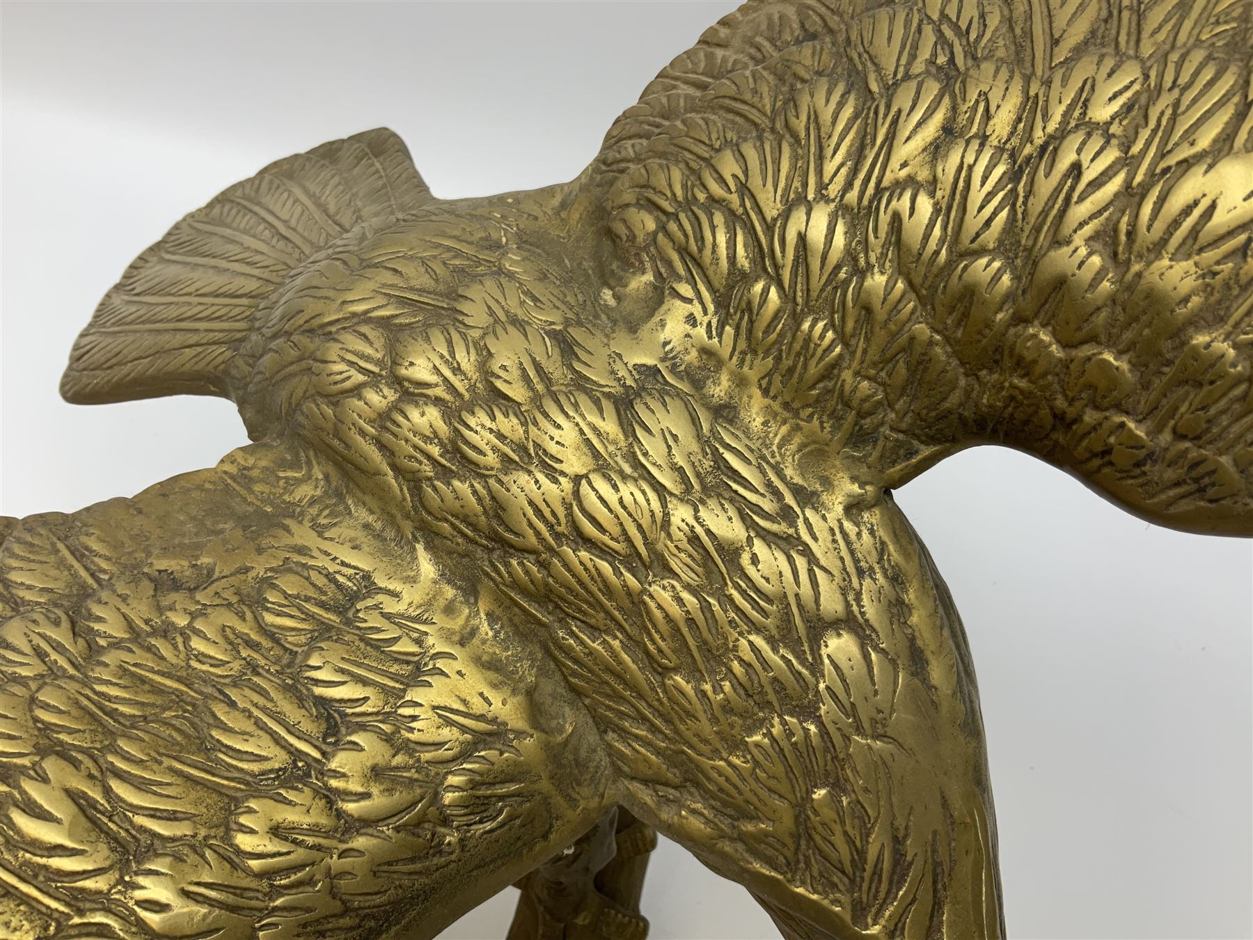 Large brass figure of an eagle on a branch, H51.5cm