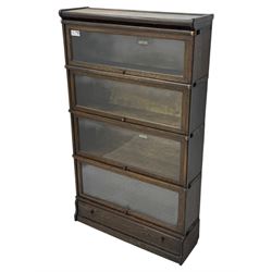 Globe Wernicke - stacking sectional library bookcase, over four glazed up-and-over doors, each bearing original makers mark, on moulded plinth base with inbuilt drawer