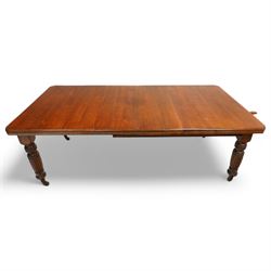 Late Victorian mahogany extending dining table with two leaves, moulded chamfered edge above, turned and reeded legs and ceramic castors, winding handle included, 205cm extended, 132cm closed, 102cm wide, 73cm high