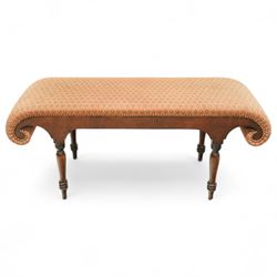 19th-century mahogany scroll end window seat, upholstered in a patterned peach coloured fa...