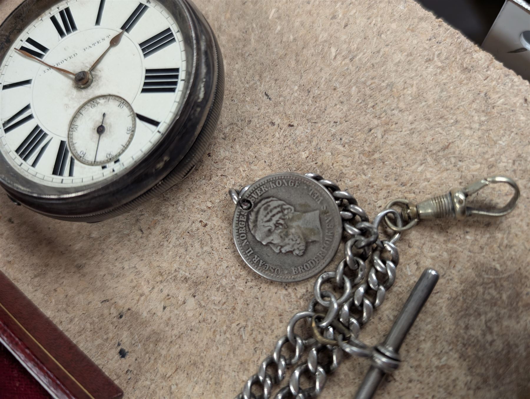 Silver Improved Patent open faced pocket watch, together with a silver Albert chain and a brass fob watch