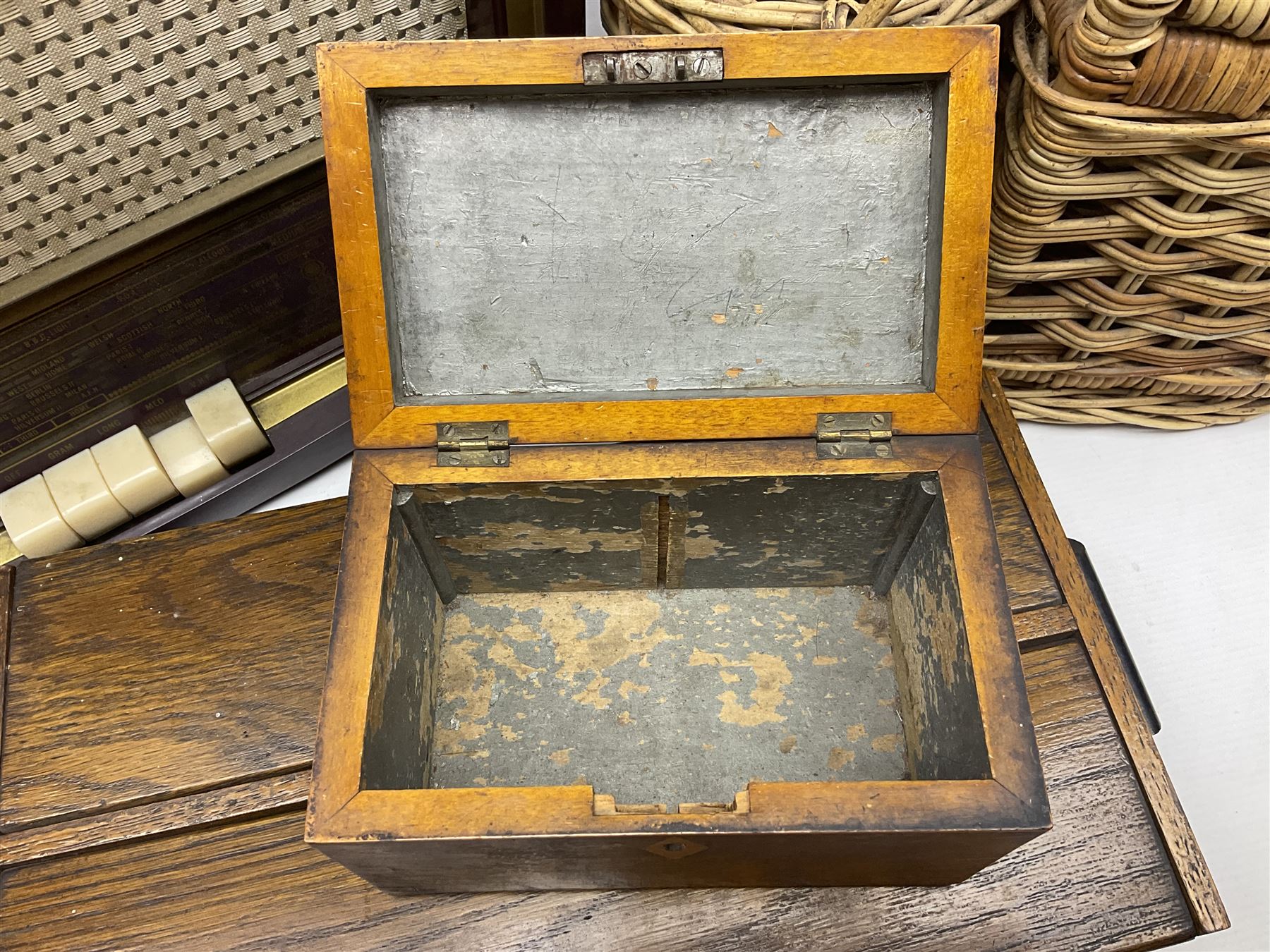 Early 20th century burr walnut tea caddy, Art Deco wooden box, wicker basket with bottle holders and a 1950s Stella radiogram