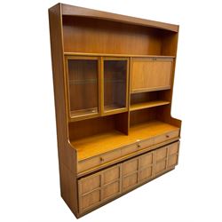 Nathan - teak wall unit, fitted with raised display cabinet and fall front compartment, three drawers and three cupboards below
