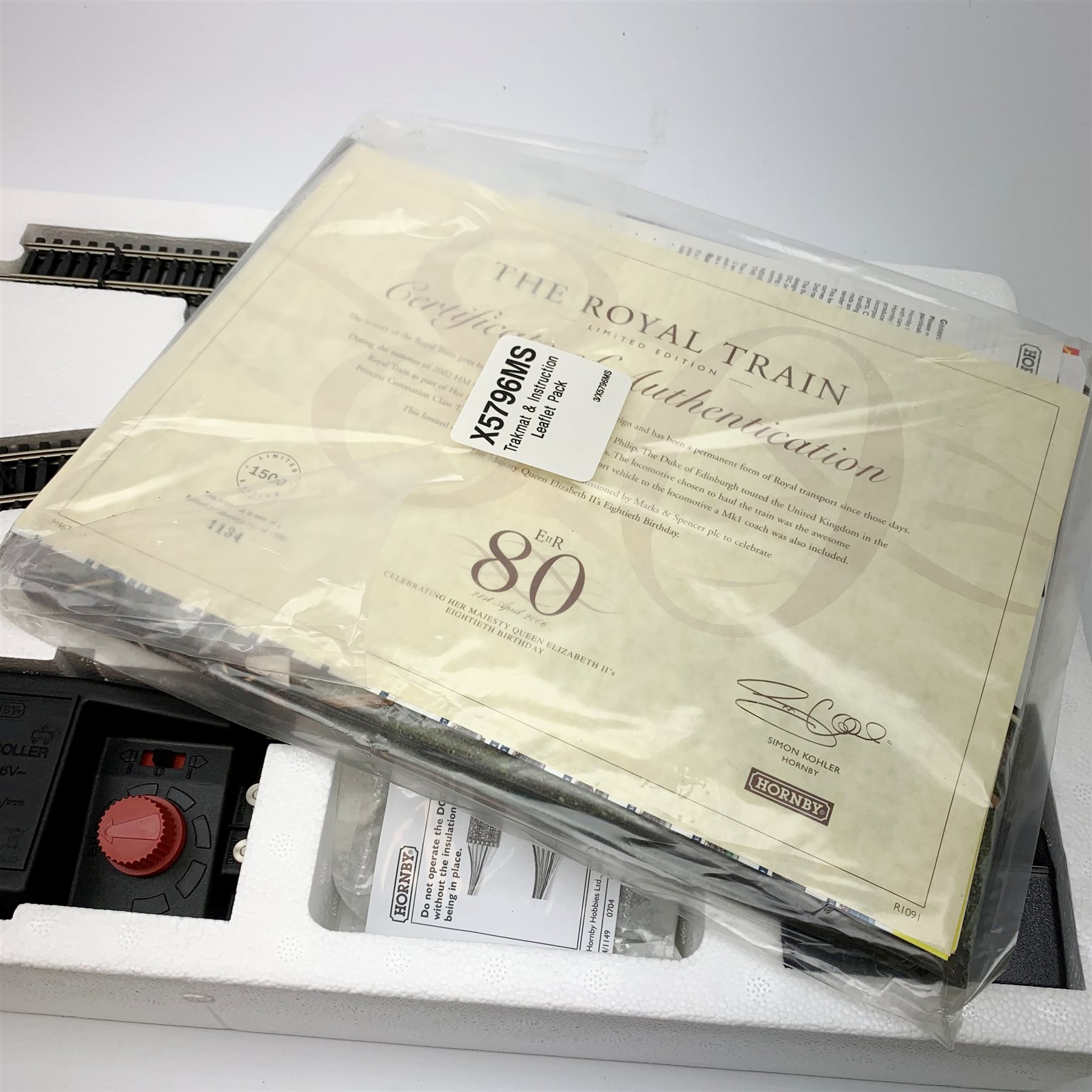 Hornby '00' gauge - limited edition Marks & Spencer The Royal Train QEII 80th Birthday Commemorative set with Princess Coronation Class 4-6-2 locomotive 'Duchess of Sutherland' No.6233 with three coaches, No.1134/1500, boxed with certificate, Trakmat and Leaflet Pack