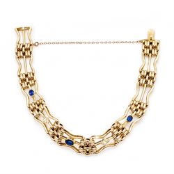 Early 20th century 15ct diamond and sapphire gate link bracelet, set with two oval cut sapphires and two old cut diamonds, stamped 15