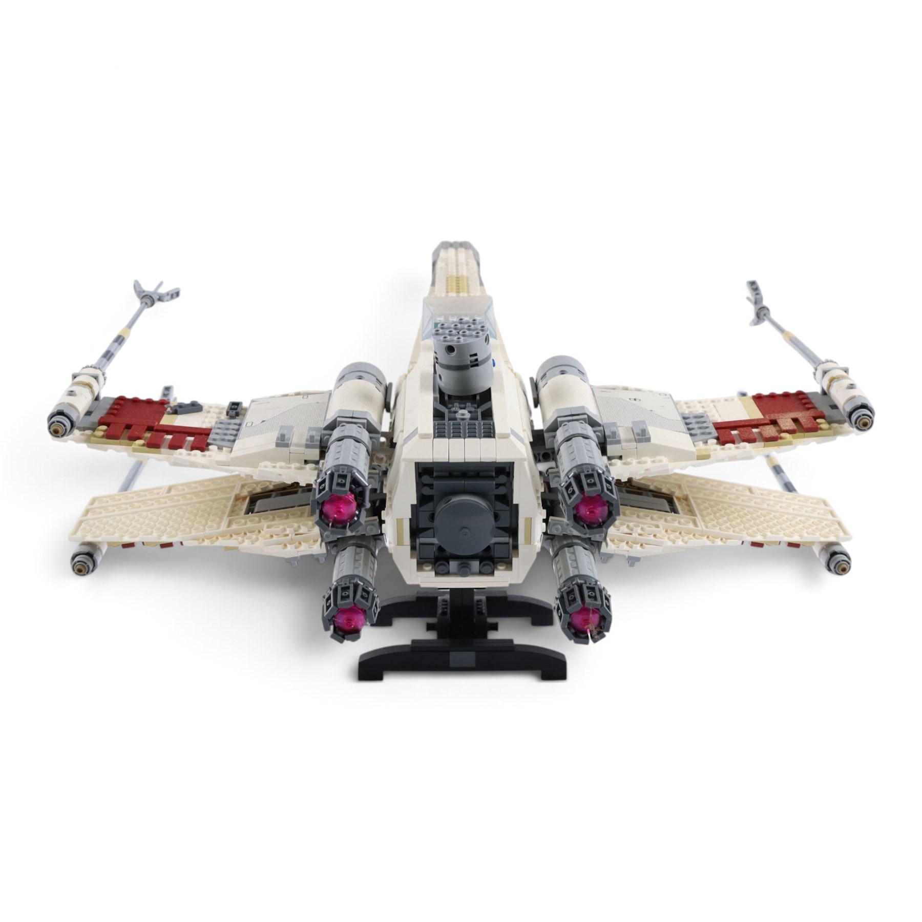 Three Lepin Star Wnrs built models, comprising Red Five X-Wing Starfighter no. 05039, Millennium Falcon no. 05132 and Super Star Destroyer no. 05028