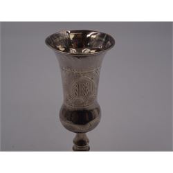Pair of 1920s silver Kiddush cups, of typical form with engraved decoration, each upon knopped stem and stepped circular foot, hallmarked J Zeving (or Joseph Zweig), London 1920, H10cm