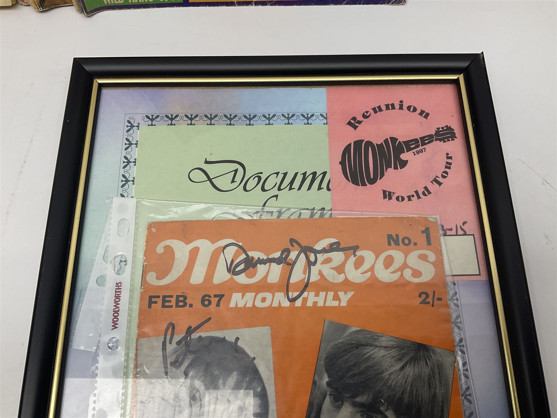 Monkees memorabilia - 'Monkees Monthly' magazine almost complete run from No.1 Feb 67 to No.31 Aug 69 (lacking nos.29 and 32); the cover of No.1 signed by all four members of the group during their 1997 Reunion Tour; quantity of A&BC bubble gum cards; programme for their only UK live performance in 1967 at Empire Pool Wembley; and other related late 1960s music magazines/paperback book